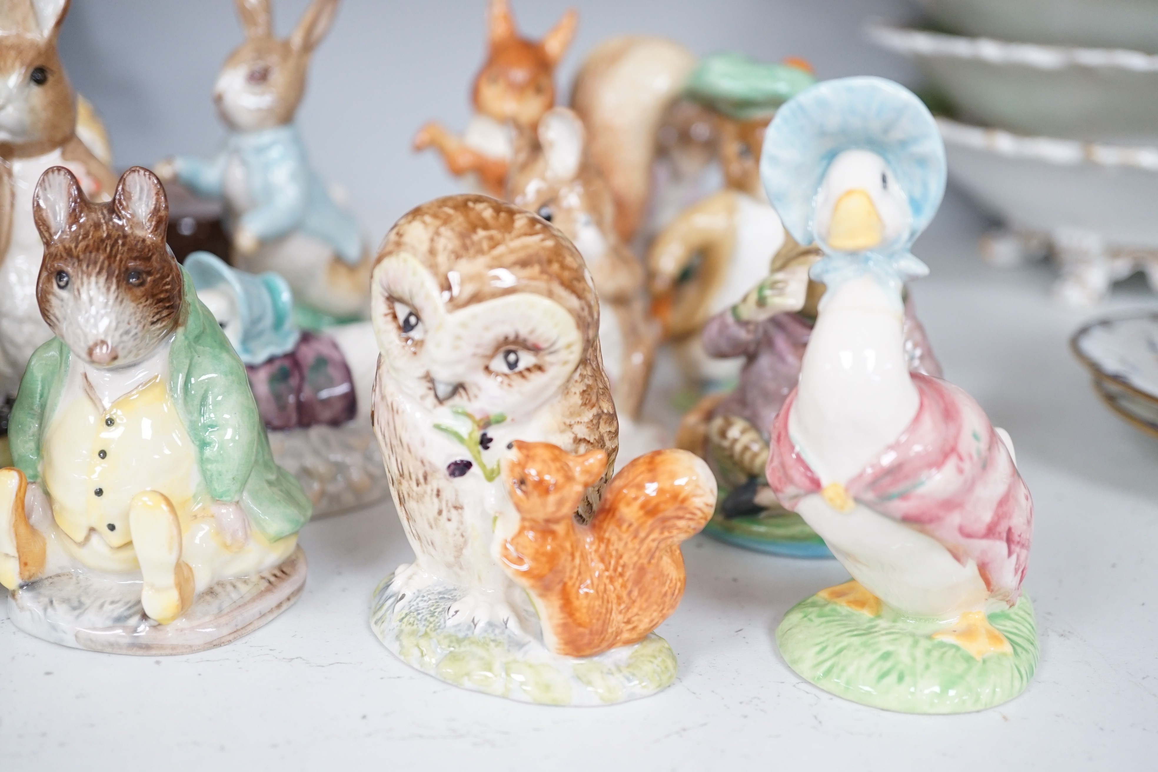 A collection Beswick, Royal Albert and Border Fine Arts Beatrix Potter figures